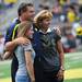 Michigan head coach Brady Hoke poses for a photo with his wife Laura and daughter Kelly on the field at Michigan Stadium before the Air Force game on Saturday. Melanie Maxwell I AnnArbor.com